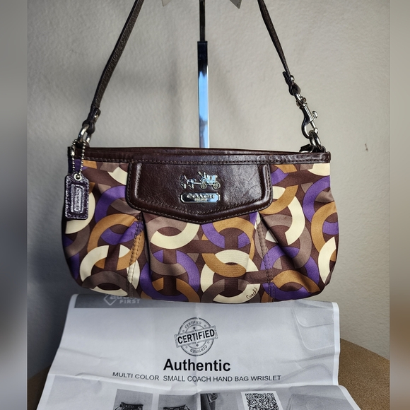 Coach Handbags - Coach Madison Wristlet Bag With COA